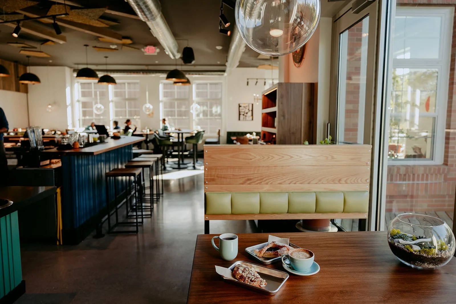 Coffee and pastries on a table inside a Traverse City cafe