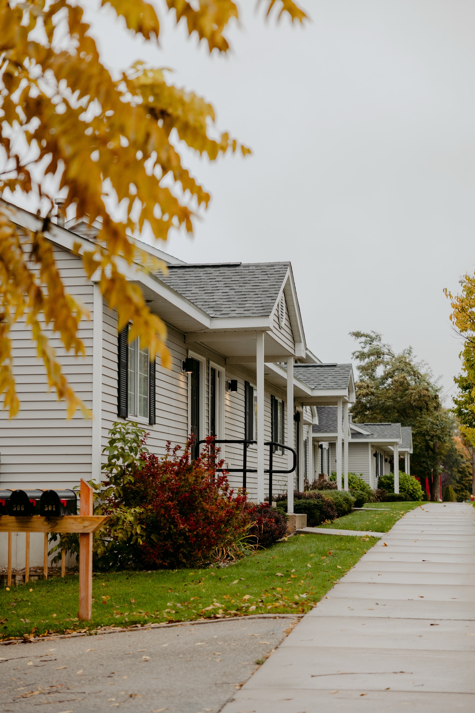 Row of four Roost North townhouses side by side in the North Boardman neighborhood of Traverse City